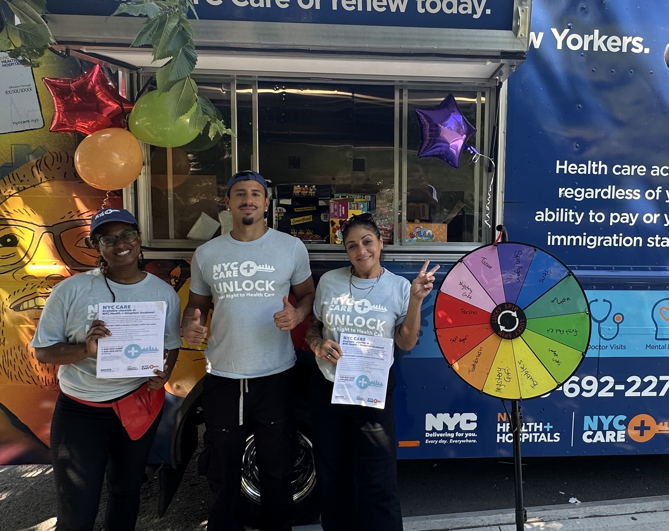 Members of the street team pose before distributing flyers and prizes
